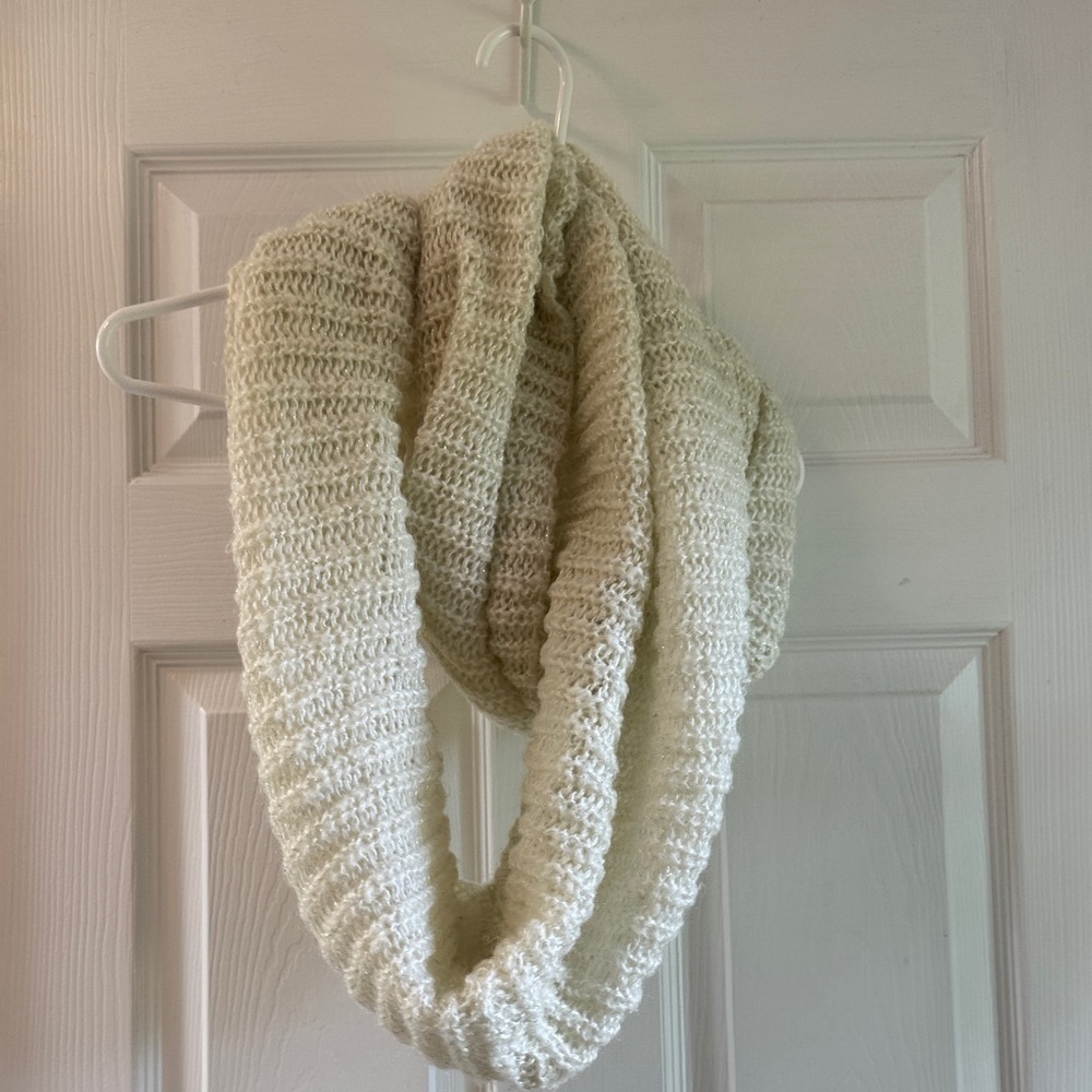 Cozy Cream Knit Infinity Scarf with Glistening Silver Detail